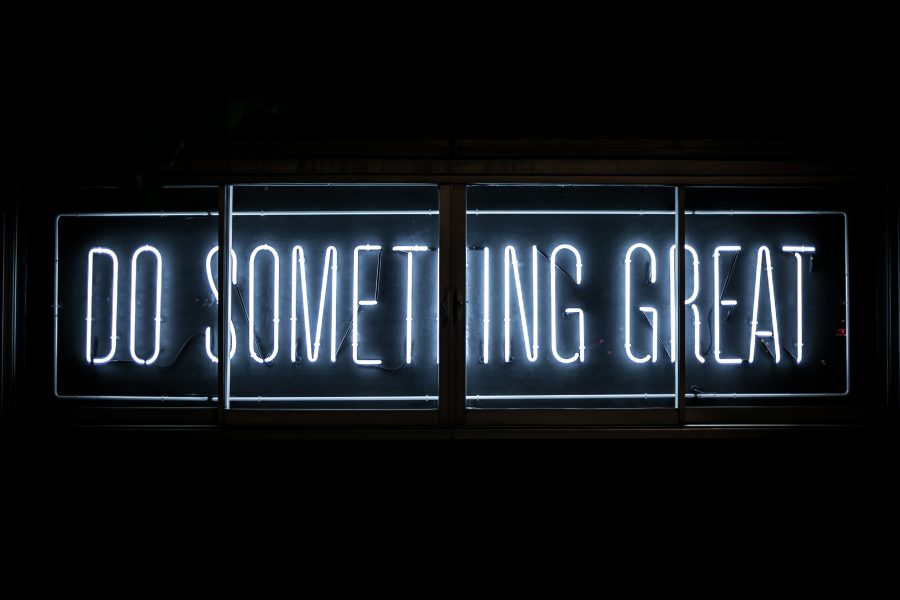 A neon-sign saying "Do something great"